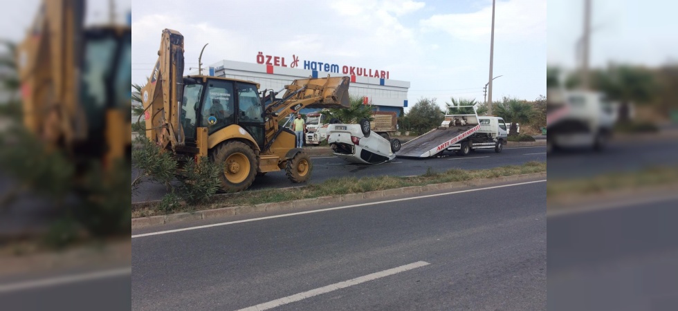 Takla atan otomobilden yara almadan kurtuldular