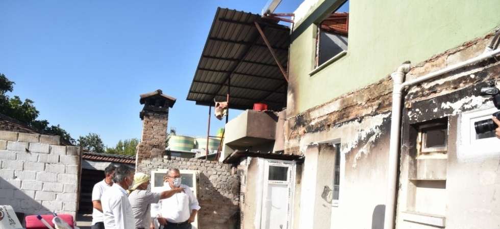 Evi yanan iki aileye Yunusemre Belediyesi sahip çıktı
