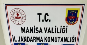 Salihli’de şüpheliden ruhsatsız tabanca ve mermi çıktı